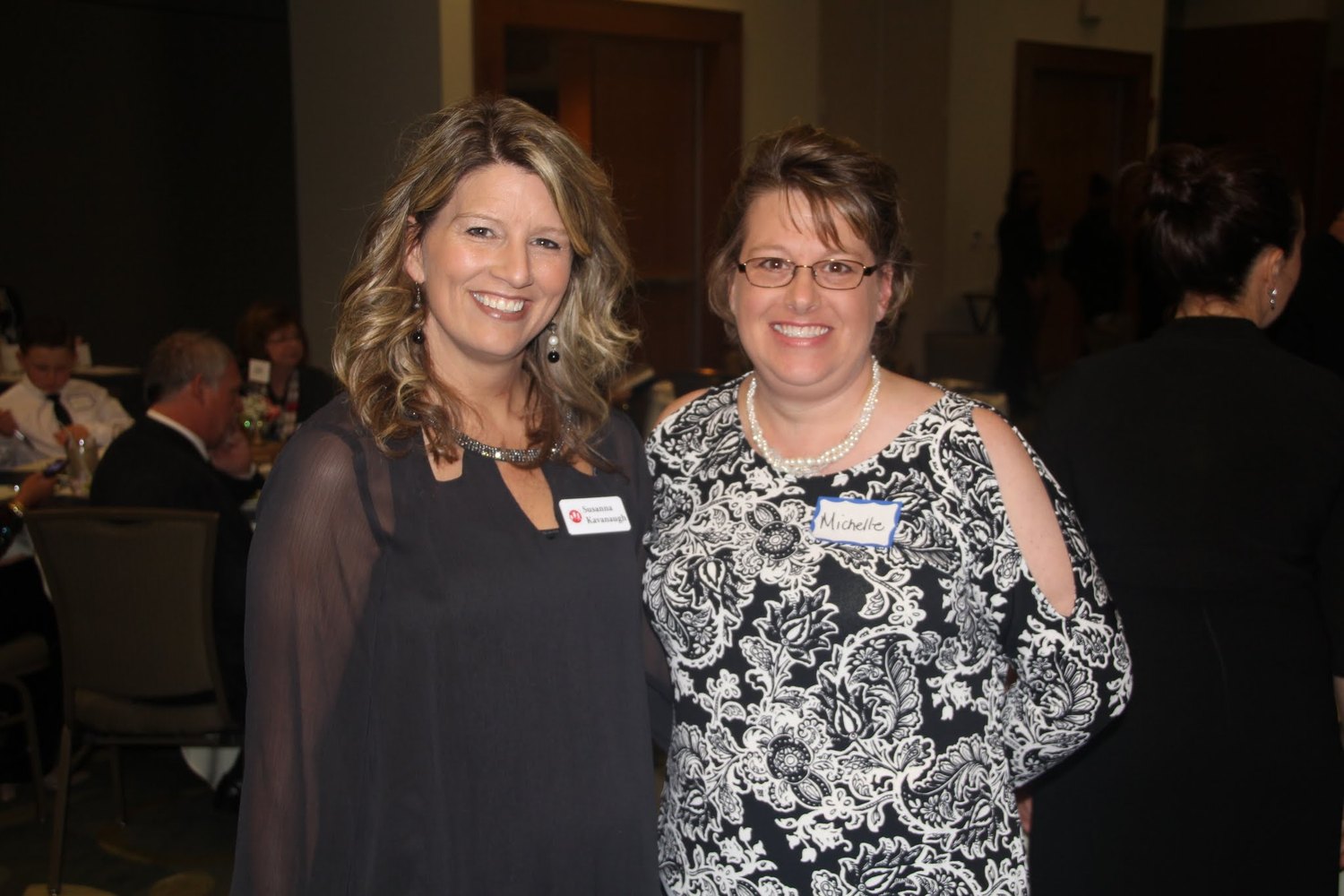 Susanna Kavanaugh and Michelle Buchanan, co-founders of Least of These Carolinas, together at an event.